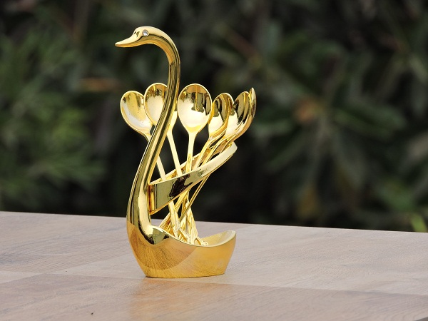GOLD COLORED SWAN SPOON STAND 6 SPOONS AND A STAND