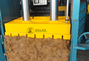 Coconut fiber baling machine