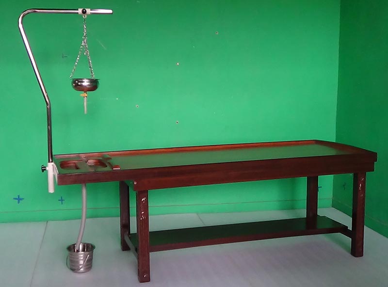 IMI Wooden Massage Cum Shirodhara Table, for Panchkarma, Feature : Fixed