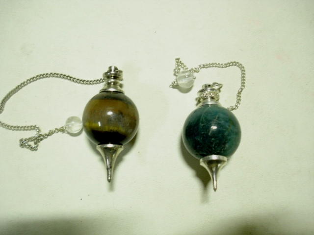 Stone sphere pendulums