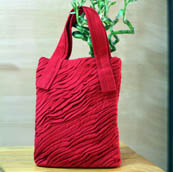 Designer Red Textured Hand bag