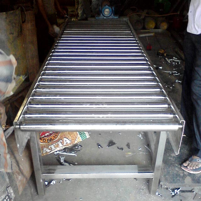 Metal Gravity Roller Conveyor, for Moving Goods, Feature : Excellent ...