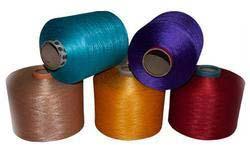 100% Polyester Spun Dyed Yarns, for Embroidery, Filling Material, Knitting, Weaving, Feature : Anti-Bacteria
