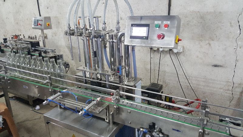 PLC Servo Based Automatic Liquid Filling Machine