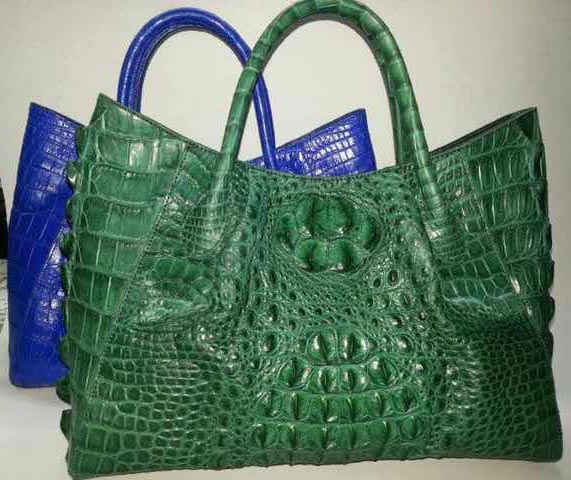 Via La Moda Showroom poster genuine crocodile leather handbag