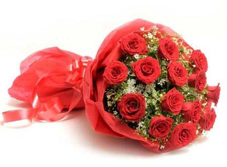 15 Red Roses in a Paper Packing
