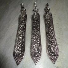 white metal incense holders
