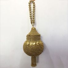 golden metal sling bag