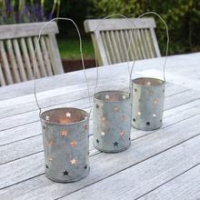 DECORATIVE STAR CUT IRON VOTIVES