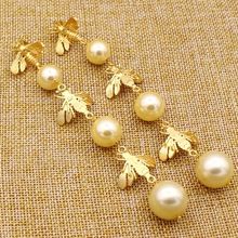 Golden Color Round Shape Pearl With Butterfly Cap earing