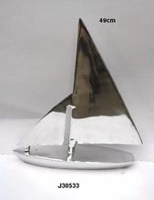 Cast aluminium boat replica with mirror polish