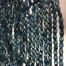 London Blue Topaz Faceted Oval Beads Strand