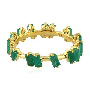 designer gold baguette emerald ring