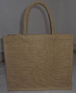 LAMINATED NATURAL JUTE BAG .