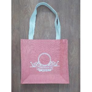 Dyed jute bag with white webbing tape handle