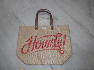 Jute bag with brown rexine handle
