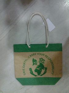 Jute bag with rope handle .