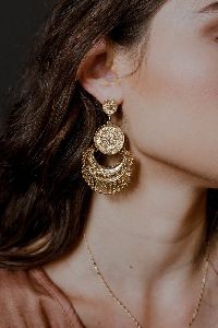 Imitation jumkha earrings.