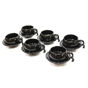 Black glossy ceramic cup and saucer