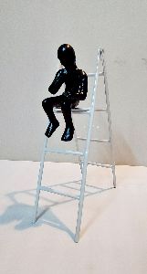The Thinker Statue on Ladder