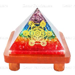 7 Chakra Stone Orgone Vastu Pyramid With Golden 7 Gems Symbol And Brown Wooden Stand