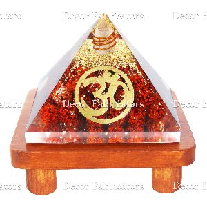 Orgone Rudraksh Stone and Golden Om Symbol Vastu Pyramid with Brown Wooden Stand