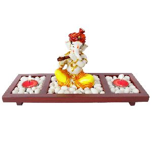 Yellow Sitting Bansuri Playing Ganesha Decor On Wooden Tray