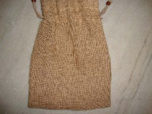 NATURAL JUTE POUCH WITH COTTON DRAWSTRING     .