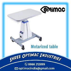Optical motorized table with drawer
