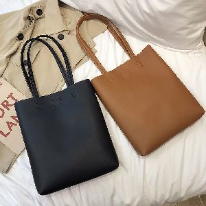 Ladies black and brown bags