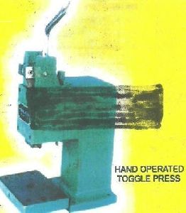 Toggle Press