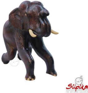 Polished Wood Saluting Elephant Statue, For Garden, Home, Office, Feature : Best Quality, Complete Finishing