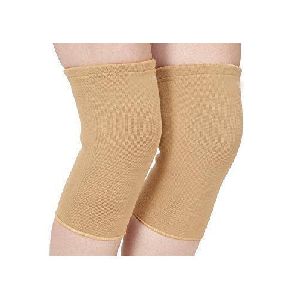 beige black knee cap