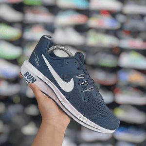 nike run vtility shielo price
