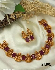 Gold plated lakshmi with ruby stone neck set