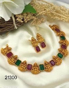 Gold plated lakshmi with ruby stone set