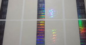 Metalized Strip on Transparent Hologram