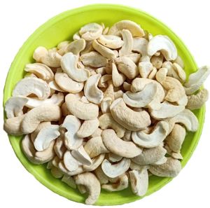 Split Cashew Nuts 12 Months, Packaging Type : Plastic Bag, Packaging Size : 25-50kg