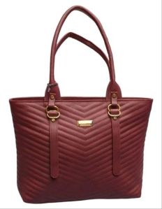 Rust Red Ladies Rexine Hand Bag, Technics : Machine Made, Specialities : Completet Finishing, Durable