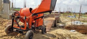 CONCRETE MIXER WITH HYDRAULIC HOPPER