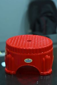 Red Plastic Bathroom Stool