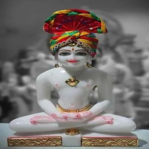 Polished Carved White Marble Mahavir Swami Statue, Position : Sitting