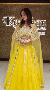 Net Yellow Embroidered Cape Ladies Lehenga Choli