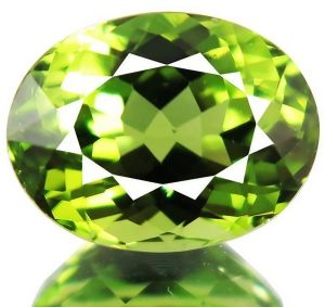 Polished Oval Natural Peridot Gemstone, Color : Green for Jewellery