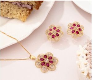 Gold Stud with Precious Stone