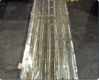 PRECISION MILLING OF MAGNESIUM BRONZE LINERS FOR THE STEEL PRODUCING I