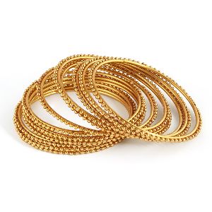 Sukkhi Glimmery Gold Plated Bangles For Women Set Of 12