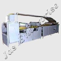 Dough sheeter with rotery die cutting unit