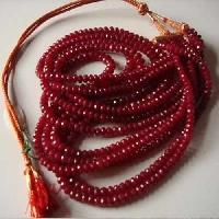 dyed ruby faceted beads