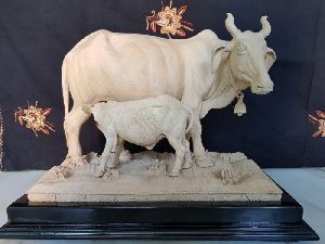 Wooden Cow and Calf Statues